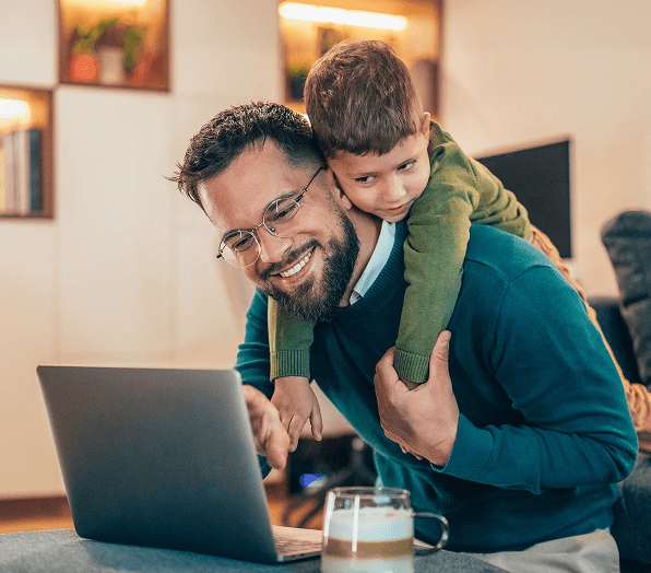 Son hugging father from the back