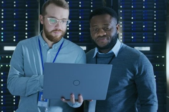 Two cyber security experts working together