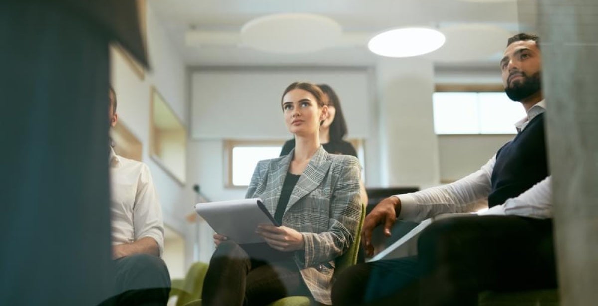 Two people in a work meeting
