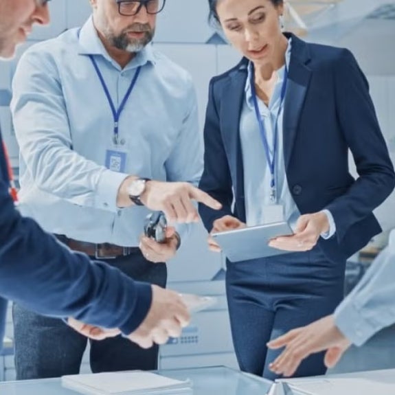 A group of data scientists and data analyts in a discussion at work