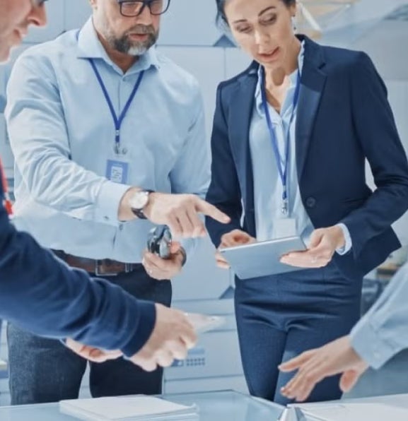 A group of data scientists and data analyts in a discussion at work