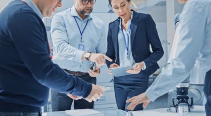 A group of data scientists and data analyts in a discussion at work